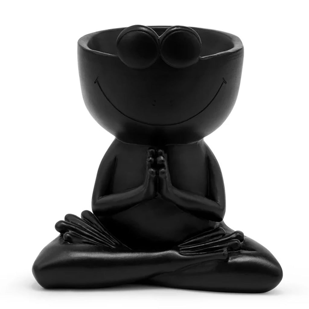 Add a touch of whimsy to your garden and indoor spaces with this charming black frog head planter. Made of durable resin, this planter is sure to withstand the elements while providing a fun accent for your plants. The perfect way to add personality to your outdoor or indoor spaces! Measures 3" L x 3" W x 1.5" H.