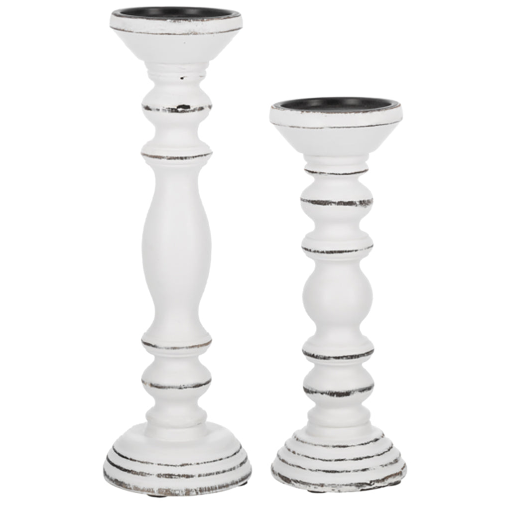 These White Finial Pillar Candle Holders will add a touch of charm to your home décor. Its simple yet rustic design will bring a warm and inviting atmosphere to any room. Perfect for creating a cozy and approachable ambiance for any occasion. Measures 5"W x 5"D x 15"H.