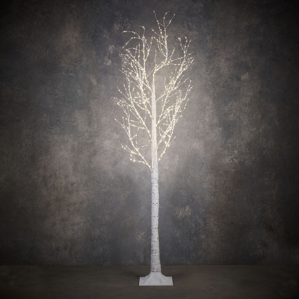 Enhance the winter wonderland in your outdoor space with the Outdoor Birch Tree LED Classic White. Standing at an impressive 83 x 39 inches, this enchanting tree is adorned with 750 LED Classic White lights that radiate a warm and inviting glow.