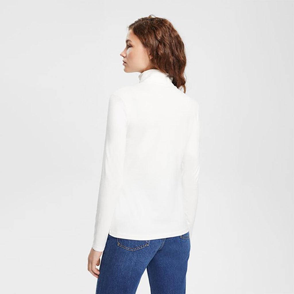 Whether you're pairing it with jeans, skirts, or under your favorite sweater, the Long Sleeve Jersey Turtleneck in White adds a touch of classic elegance to any look while keeping you warm during the colder months.