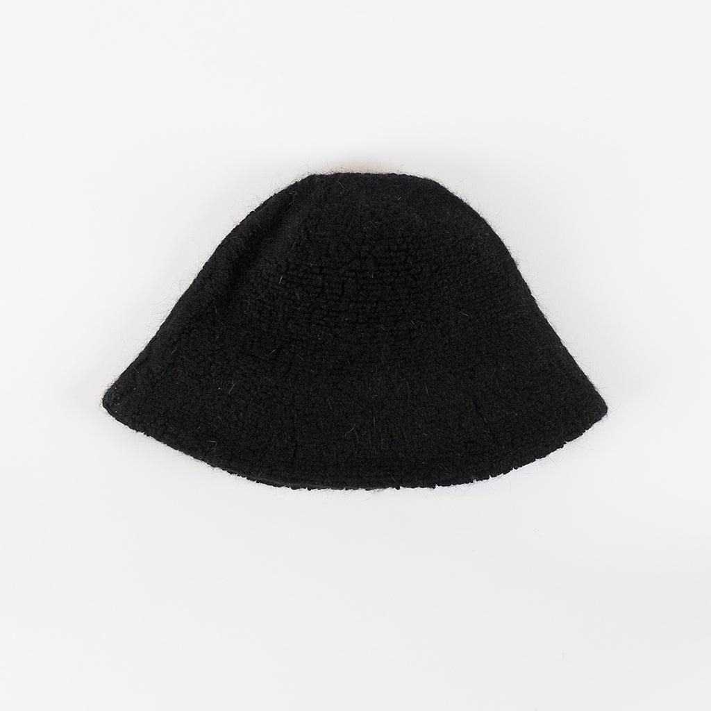 Crafted for comfort and style, this hat brings a touch of cozy luxury to any outfit. The soft and plush sherpa material provides a warm and comfortable feel, making it ideal for cooler seasons or adding a cozy element to your look. With its versatile and neutral design, this bucket hat is easy to style, complementing a wide range of outfits and aesthetics. 