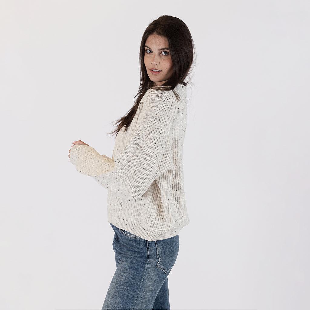 Crafted with attention to detail, the ribbed texture adds a touch of sophistication, while the 3/4 zip design offers a modern twist to a classic silhouette. 