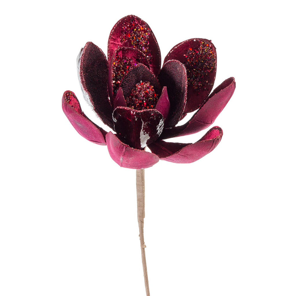 Enhance your floral arrangements with the captivating allure of the Magnolia Velvet Stem, measuring a graceful 21 inches. The deep, rich color and jewel accents of this velvet stem add a touch of opulence and sophistication to your décor.