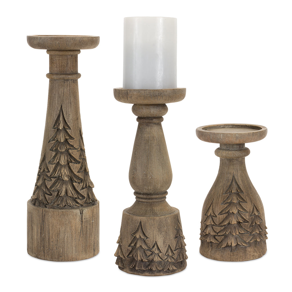 Introduce a touch of natural elegance to your home décor with this captivating Pillar Candle Holder Set of 3, featuring intricately carved trees in the base. Crafted from durable resin, each candle holder comes in varying heights, measuring 7.25 inches, 10 inches, and 12.25 inches respectively.