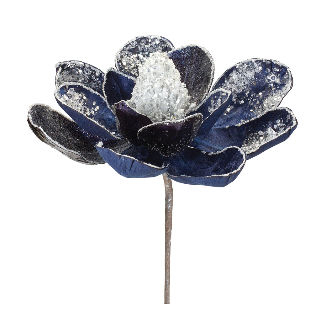 Elevate your floral arrangements and home décor with the Magnolia Stem in Blue Velvet. This 19-inch stem boasts rich, deep blue colors that add a touch of sophistication and elegance to any setting.