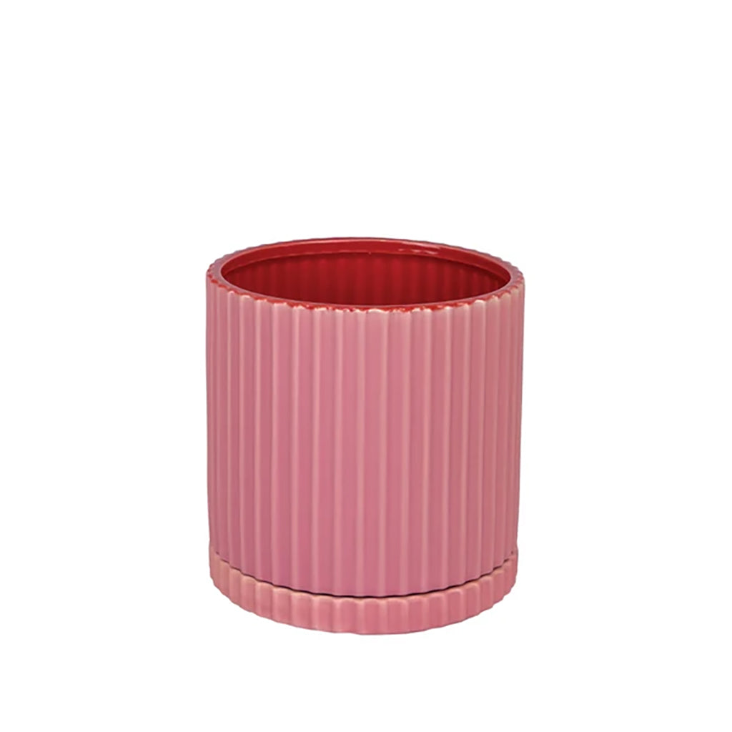 Brighten up your home with the lively and inviting Caris Pot Pink. Add a splash of color to any room and transform your living space into a warm and welcoming haven.