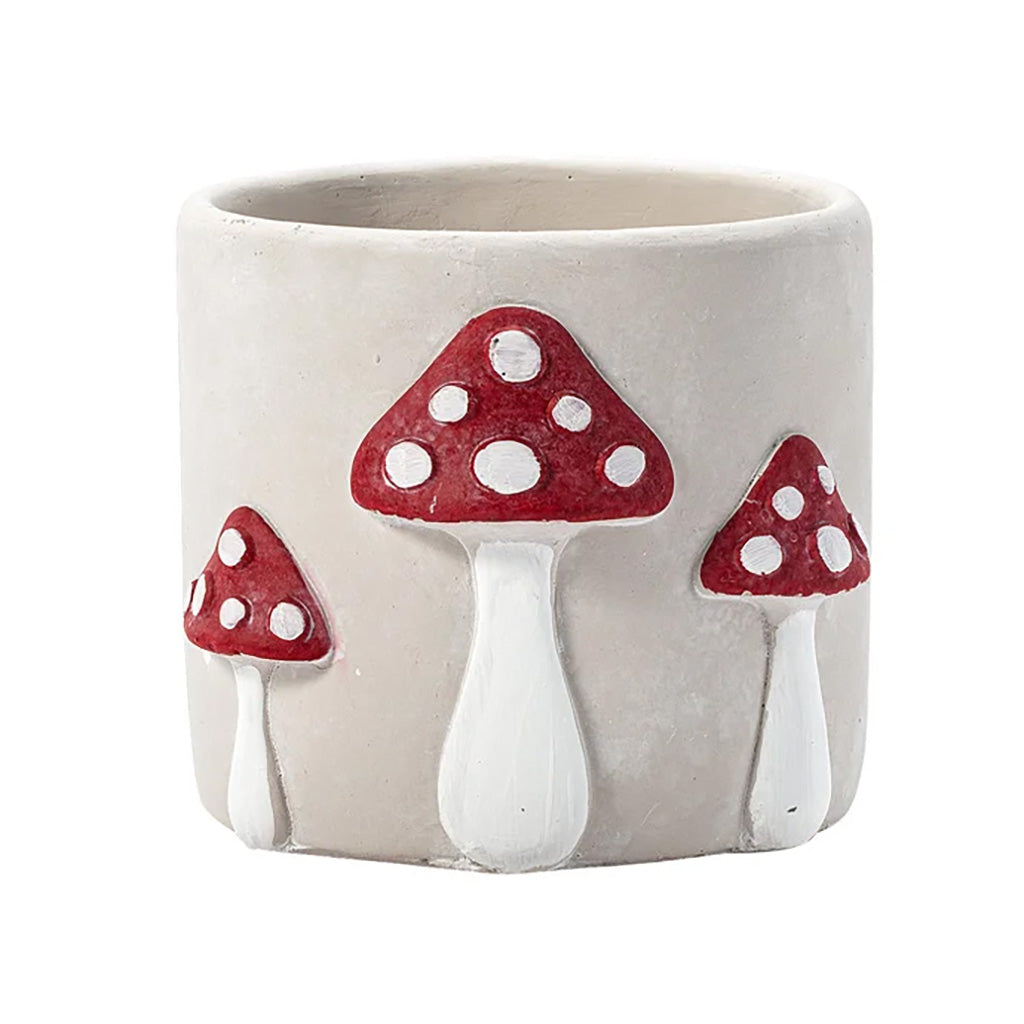 Transform your space into a whimsical wonderland with the versatile and stylish concrete Mushroom Planter.