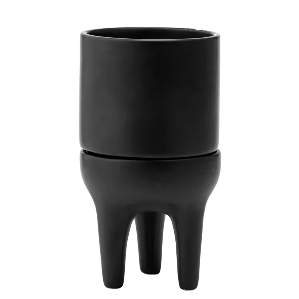 Contemporary style meets low maintenance convenience. This Black 3-Leg ceramic Planter with Saucer brings a touch of modern elegance to any plant display. Measures 3.75in H x 4in W x 4in.&amp;nbsp;