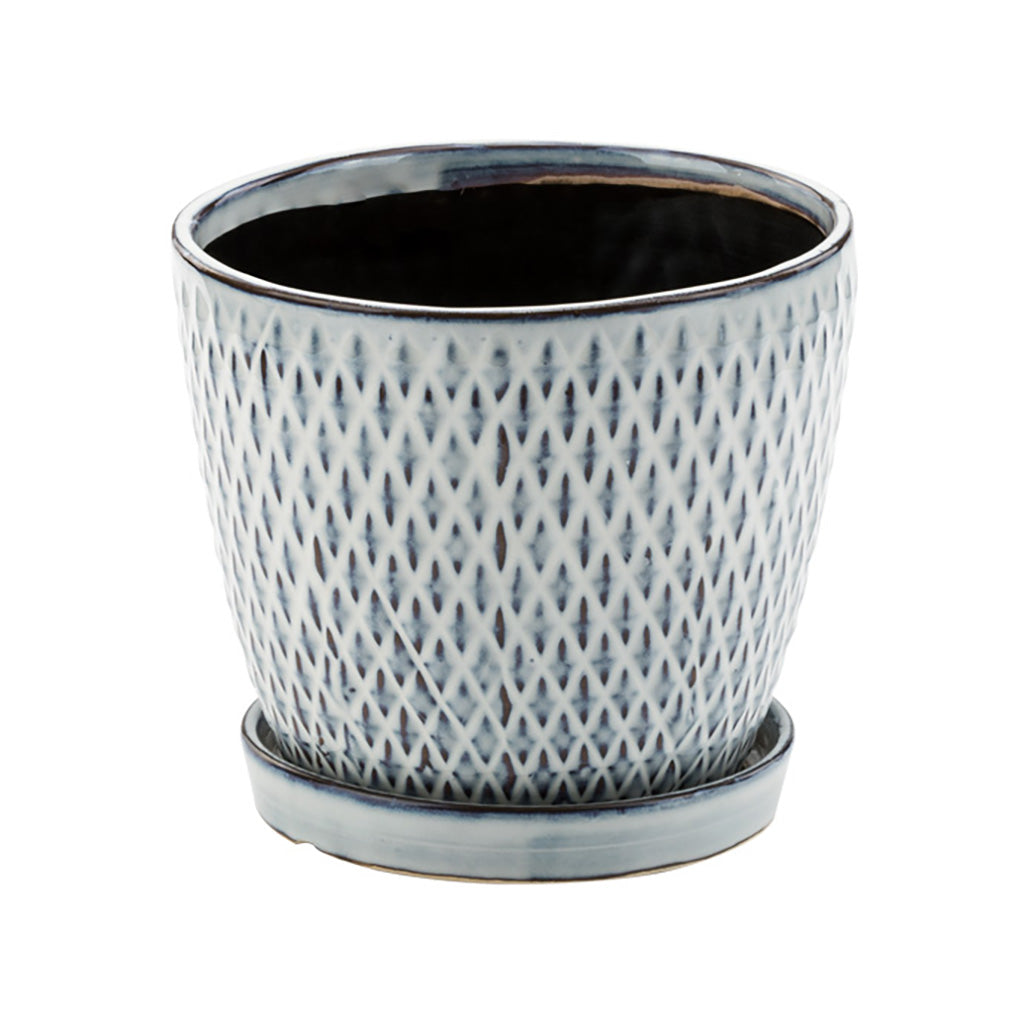 Elevate your plant game with this ceramic pot featuring an elegant, modern design. Perfect for adding a touch of sophistication to any room in your home.