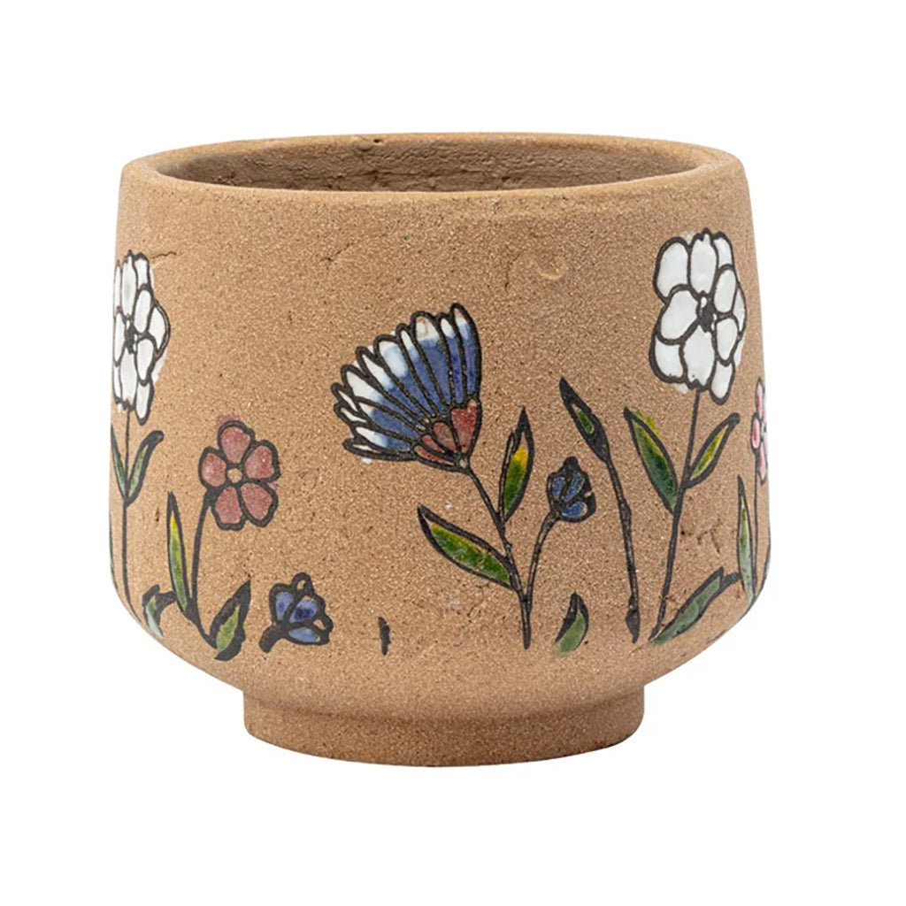 Add a touch of whimsy and charm to your home or garden with this beautiful large textured floral planter. You'll love the unique design and vibrant colors of this Terra Cotta planter, measuring 5.5"L x 5.5"W x 5"H. Bring some life to any space and showcase your favorite plants with ease.