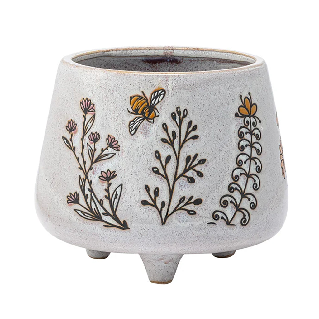 Elevate your space with a touch of nature. This beautifully crafted ceramic planter features a charming bumblebee design and is the perfect size for displaying your favorite plants. Plus, its sturdy footed design ensures your plants are always well-supported. Measures 4.75&quot;L x 4.75&quot;W x 5&quot;H.&amp;nbsp;