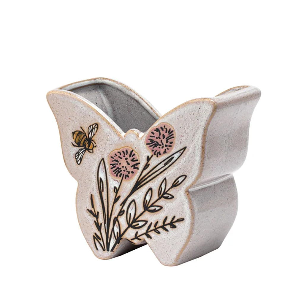Perfect for nature lovers and garden enthusiasts, this butterfly-shaped planter is a beautiful addition to any home. The intricate design featuring a bee and flowers adds a touch of whimsy and charm, making it the perfect accent piece for your indoor or outdoor garden.