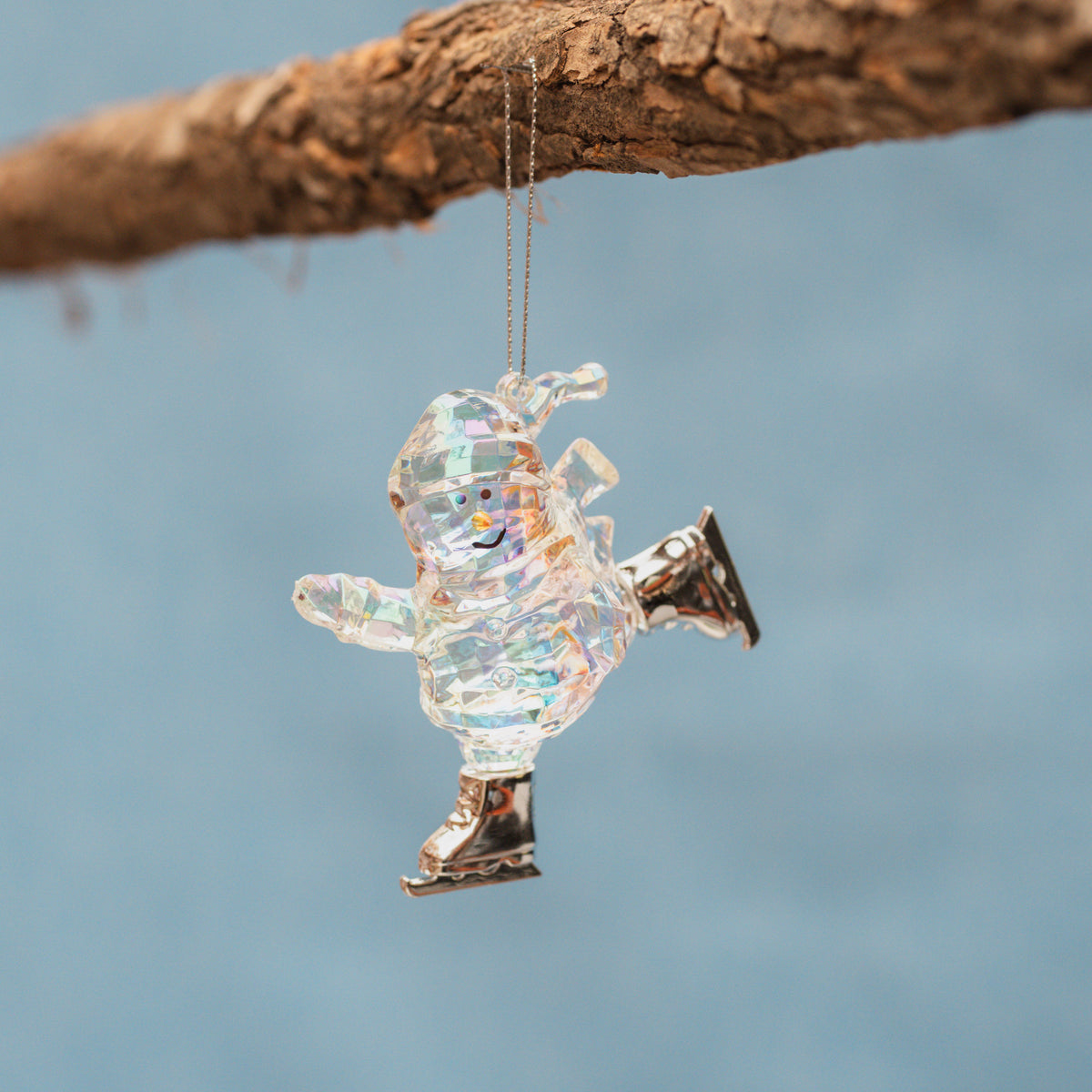 Opalescent Snowman Skating Ornament