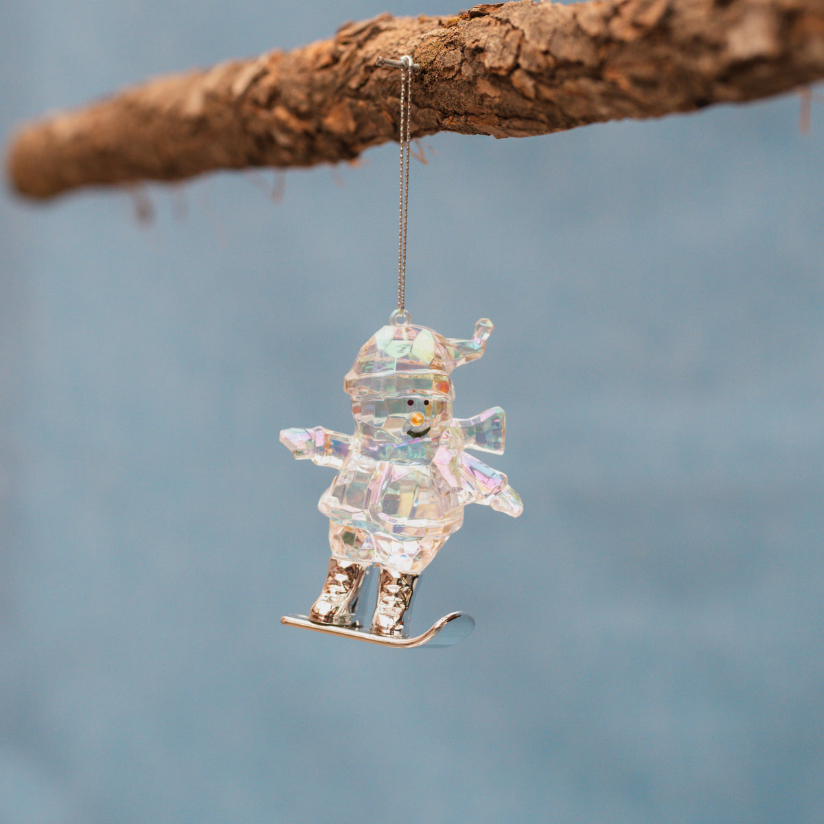 Opalescent Snowman Skiing Ornament