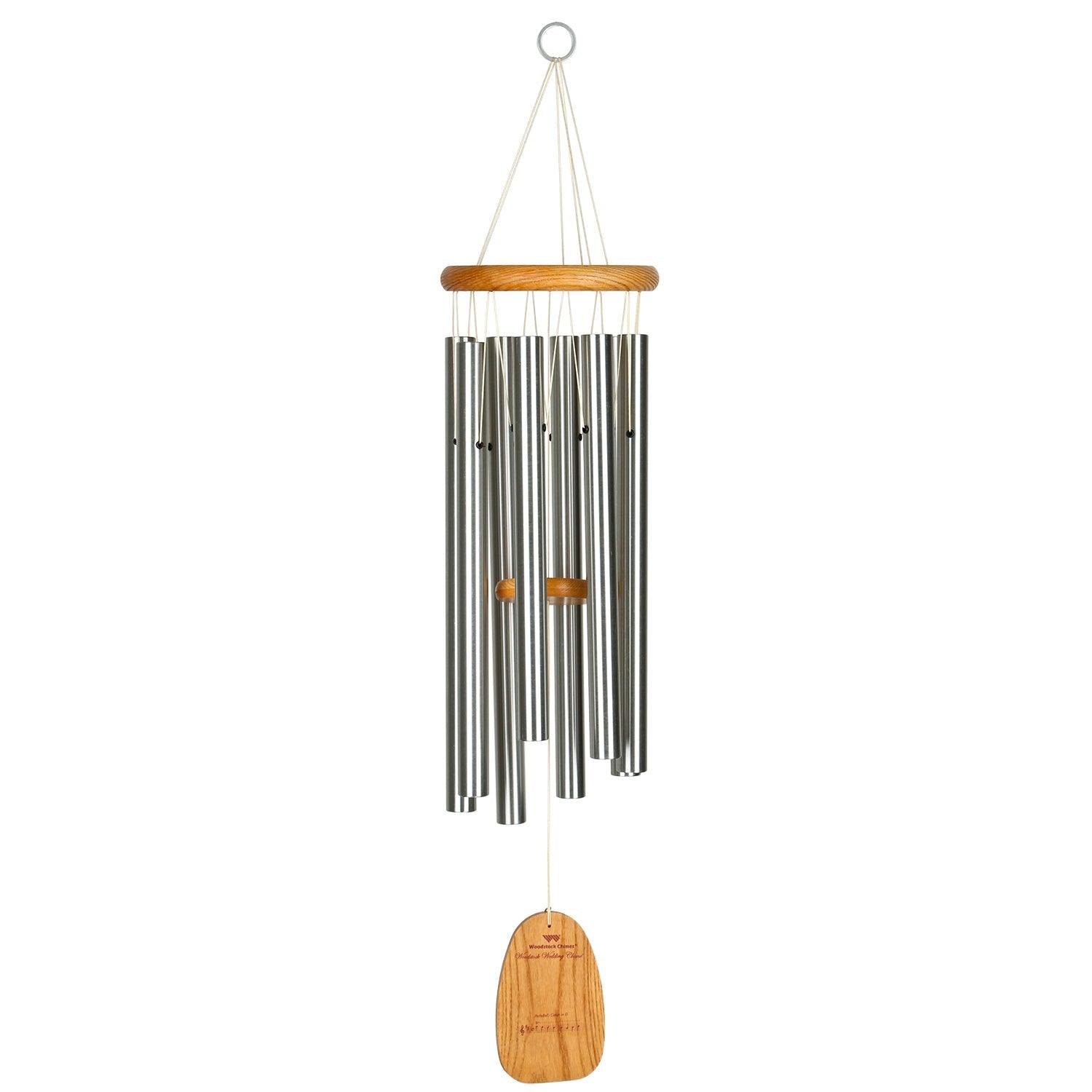 Create a beautiful, harmonious ambiance on your special day with timeless and elegant notes. This wind chime is crafted from high-quality cherry finish ash wood and features eight silver aluminum tubes, producing rich and resonant tones. Measuring at 34 inches in length and 7 inches in diameter, it's the perfect size to fit in any outdoor space.