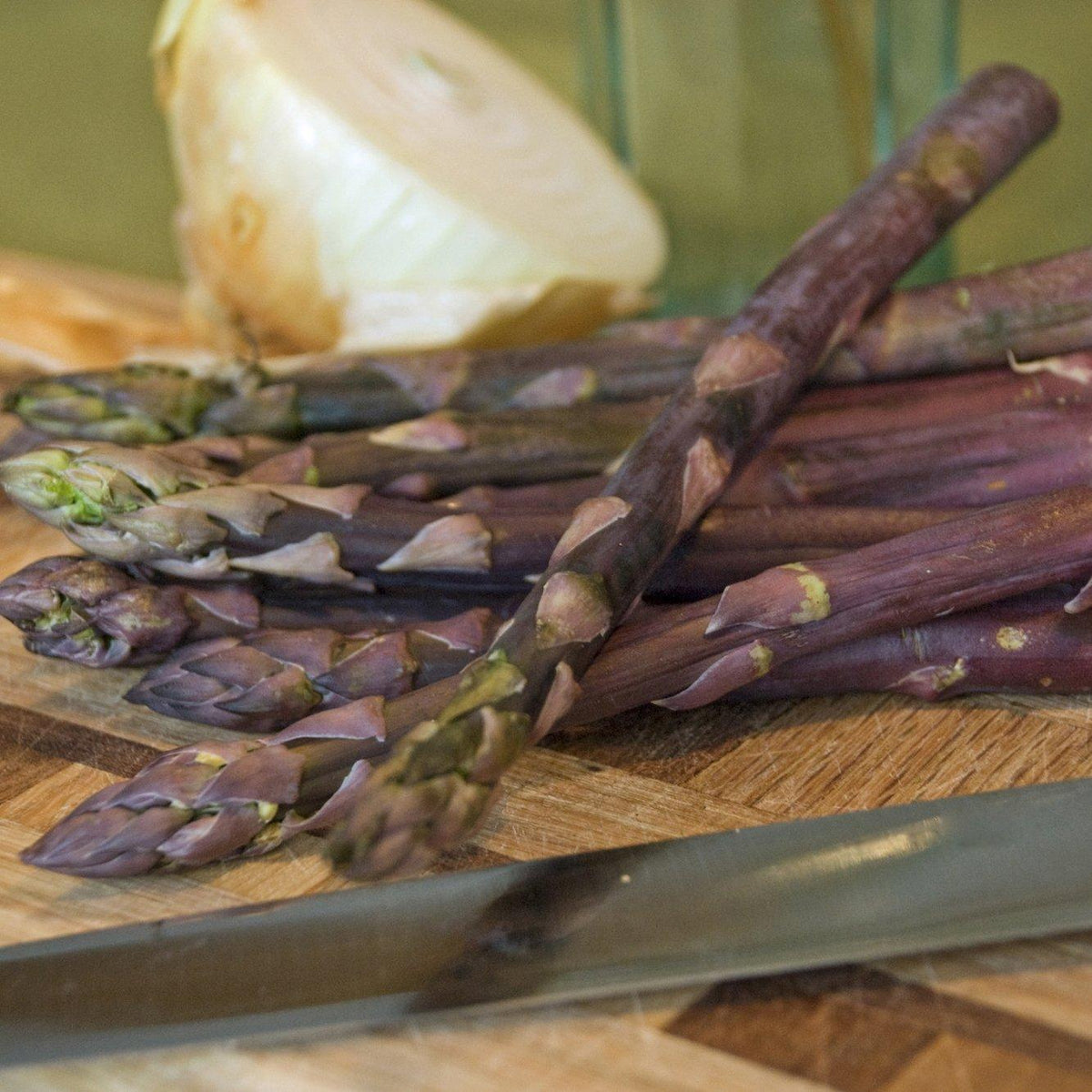  This unique asparagus variety is highly regarded as a connoisseur's selection, known for its refined and sweet flavor with a remarkable 20% more sugar content compared to traditional asparagus. When cooked, Purple Passion asparagus develops a mild nutty flavor, adding a delightful twist to your culinary creations. Its striking purple color makes it an eye-catching addition to your plate and garden. Asparagus - Purple Passion is a treat for food enthusiasts and gardening enthusiasts alike.