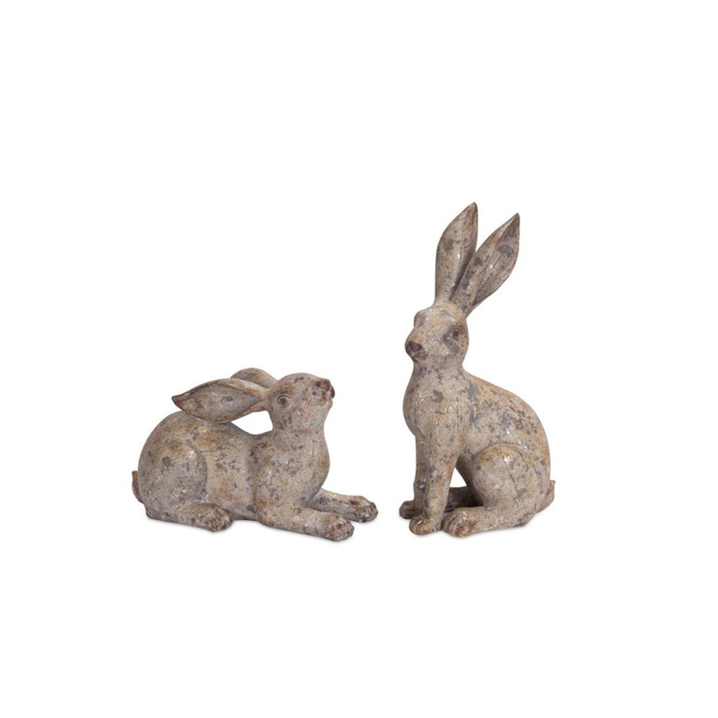 Add a touch of whimsy to any garden or home decor with our charming rabbit statues, available in two unique styles. Standing at 7"H or 14"H, these polystone statues make a delightful addition to any indoor or outdoor space. Collect both for an adorable garden set!