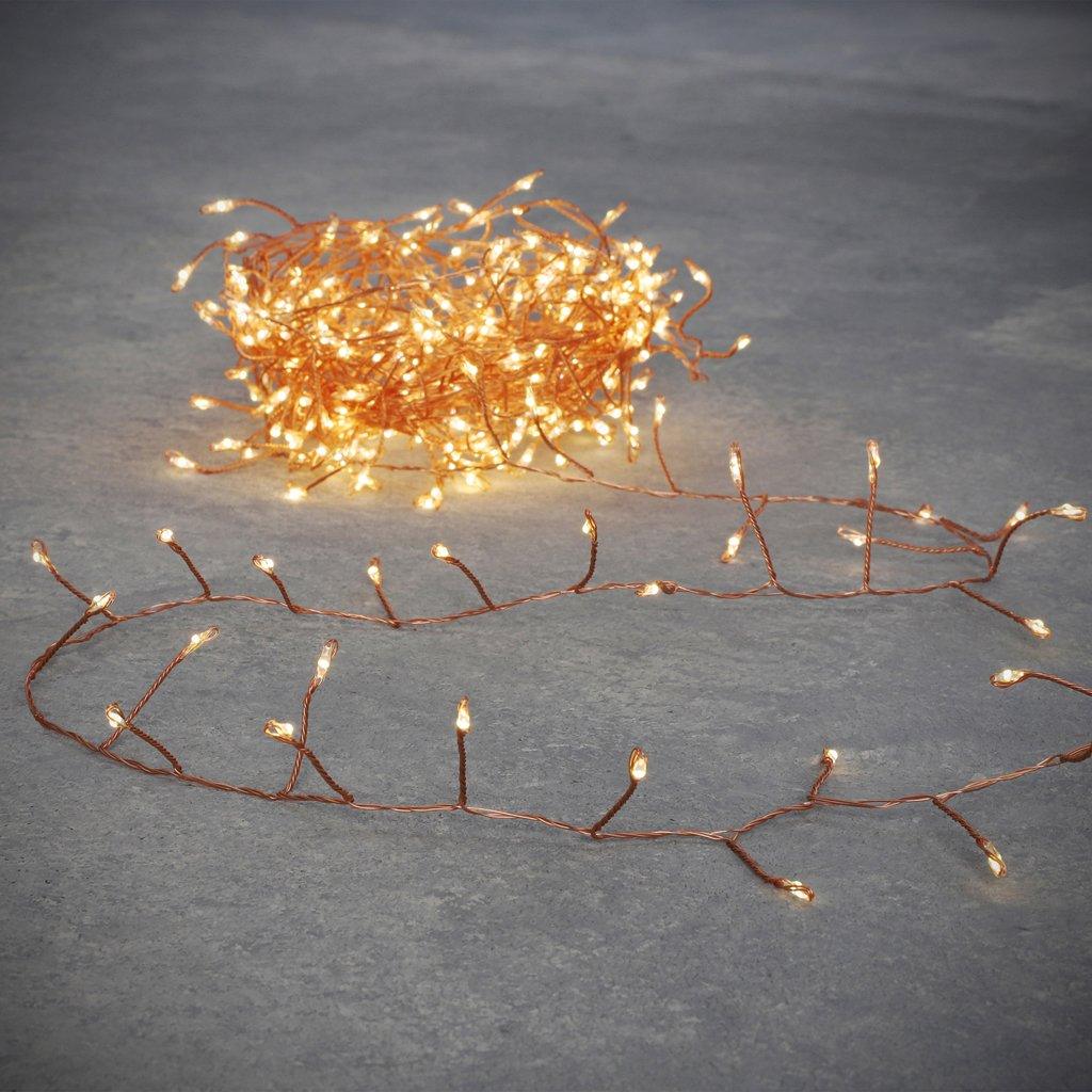 Whether you&#39;re preparing for a special event, enhancing your garden, or creating a magical outdoor ambiance, the Outdoor Cluster Wire with 400 LED lights in a stunning copper finish is your solution for effortless and enchanting lighting.