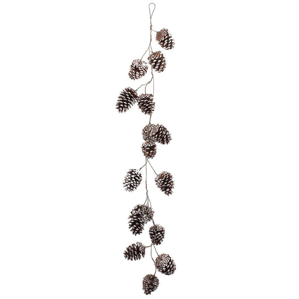 Adorn your home with the natural beauty of the White Wash Pine Cone Garland, a 43-inch long decorative piece that brings the outdoors indoors with a rustic touch. This charming garland captures the essence of a winter forest by featuring real pine cones that have been gently white-washed to evoke the serene beauty of a snow-covered landscape. 