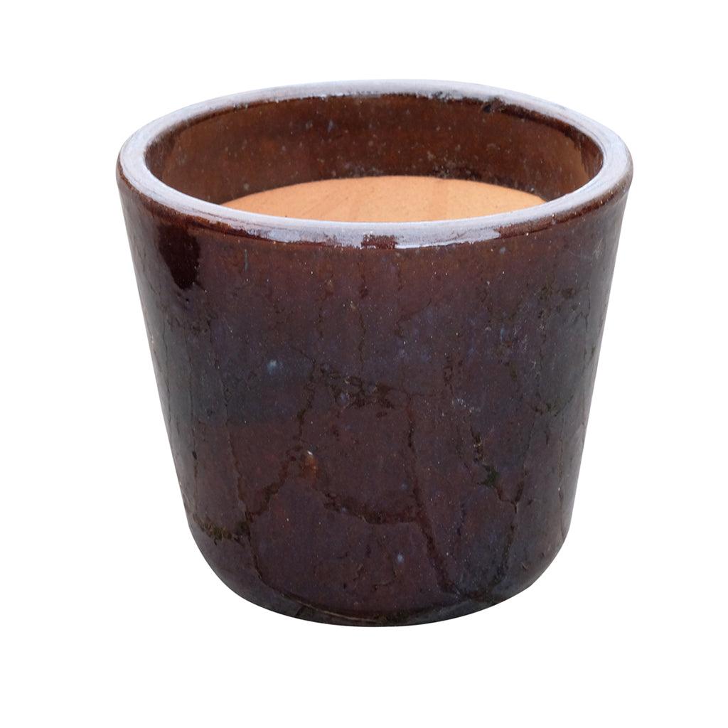 Add warmth and charm to any room with the Coffee Collection Ceramic Pot.