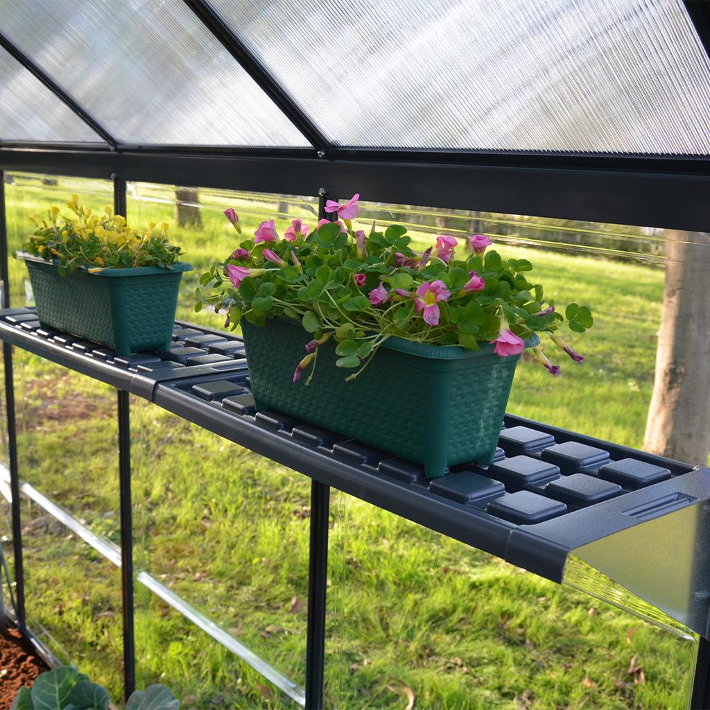 Add this greenhouse accessory into your outdoor space to showcase and store your gardening supplies.