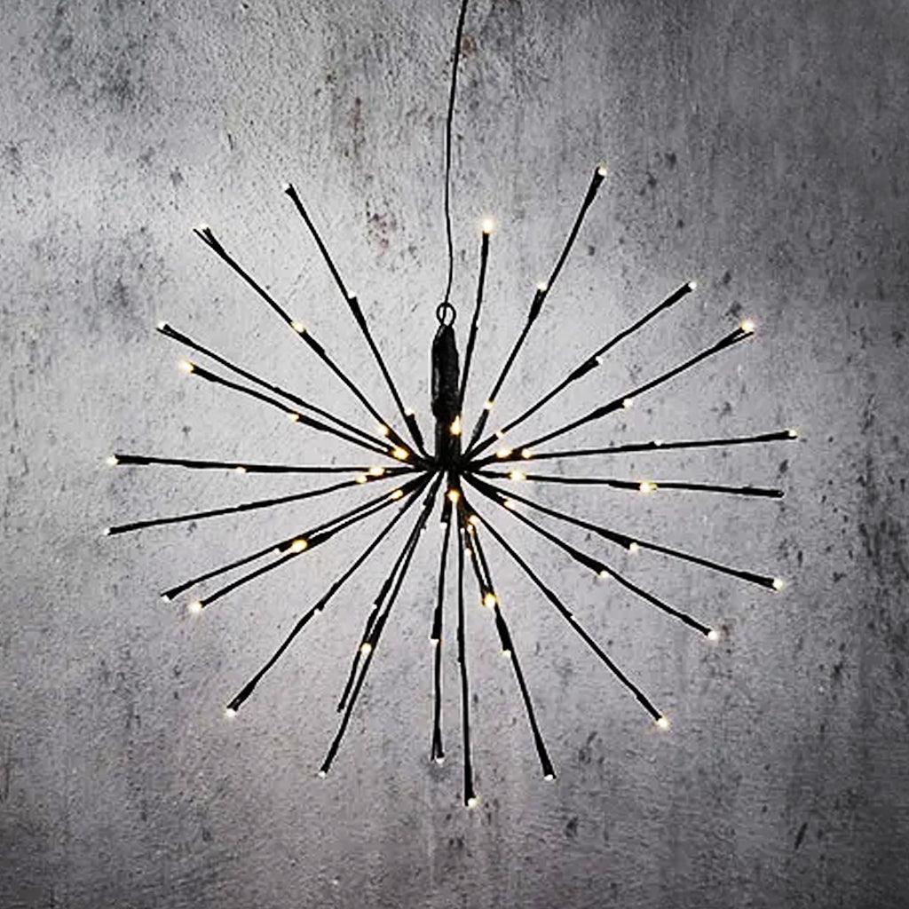 Whether you're preparing for a special event, enhancing your garden, or creating a magical outdoor atmosphere, the 12¾" Outdoor Hanging "Firework" Light will transform your space with its captivating illumination. Add a touch of magic and elegance to your décor with this mesmerizing "firework" light, perfect for both everyday use and special occasions.