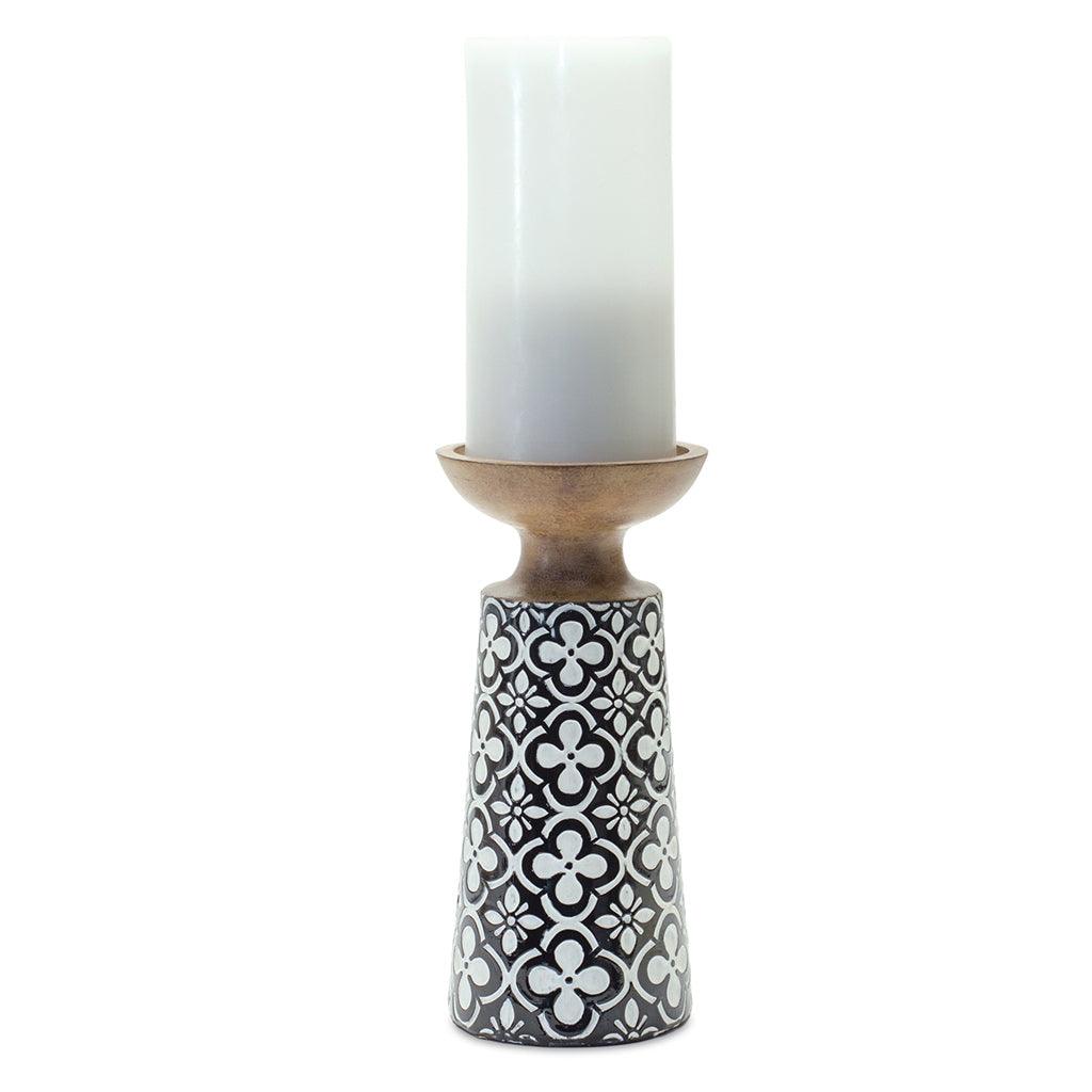 Elevate any room into a cozy and inviting space with this beautifully designed Candle Holder. Standing at 8.25 inches tall, it&#39;s the perfect size for adding a warm and elegant ambiance to your home.