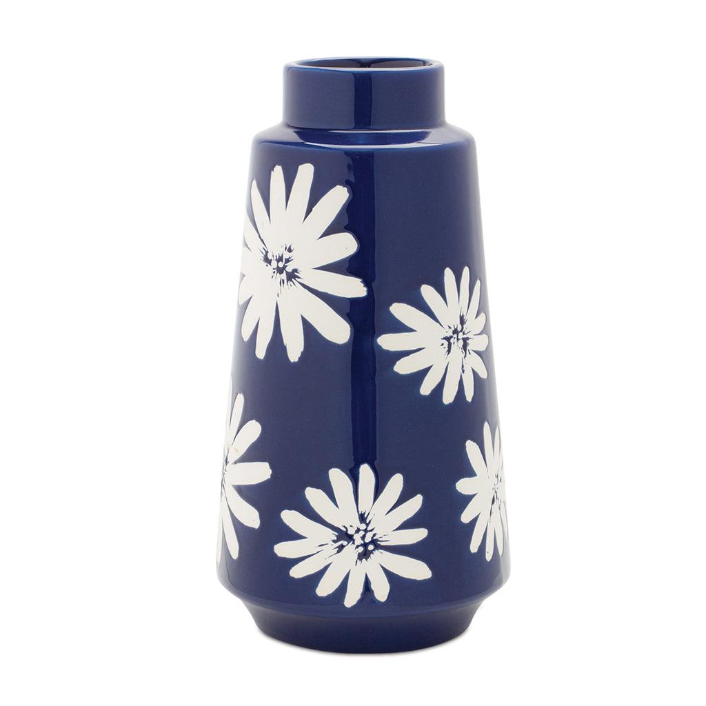 Simple stunning detail Add elegance to any room with this beautiful vase. Perfect for showcasing your favorite flowers or as a standalone piece, its stunning simple design will complement any décor and add a touch of sophistication to your home. Measures 11.75inches H.