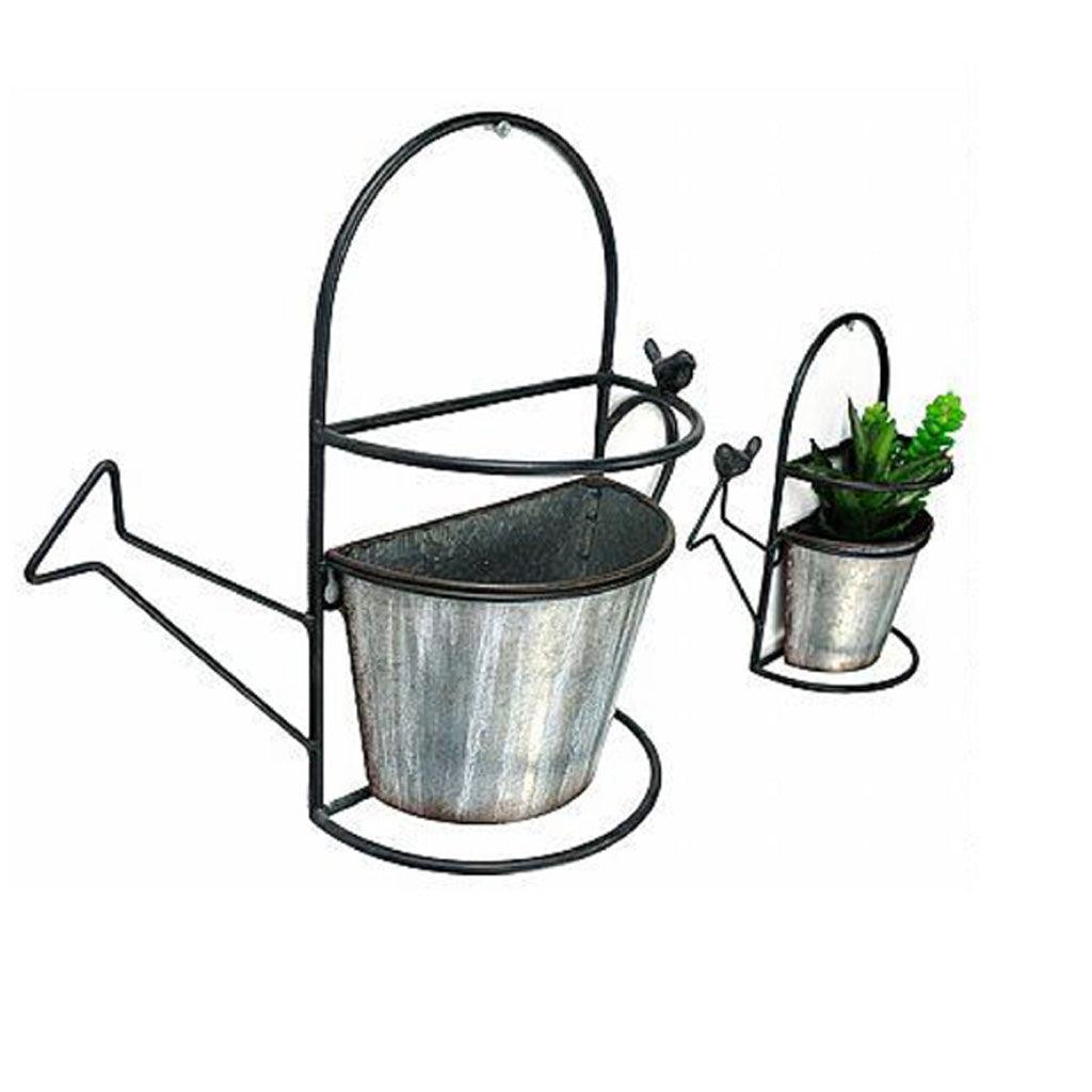 Add a touch of charm to your garden décor with this beautifully designed metal watering can. Practical and stylish, it allows you to water and display your favorite plants with ease and elegance.