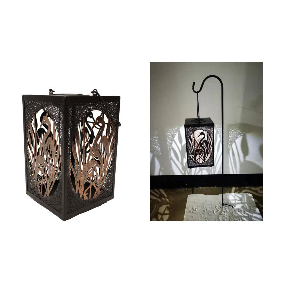 Bring the warm glow of a summer evening to your backyard with the Solar Shadowcaster Flamingo lantern. Its durable design and bright LED light make it perfect for outdoor entertaining or quiet nights at home.