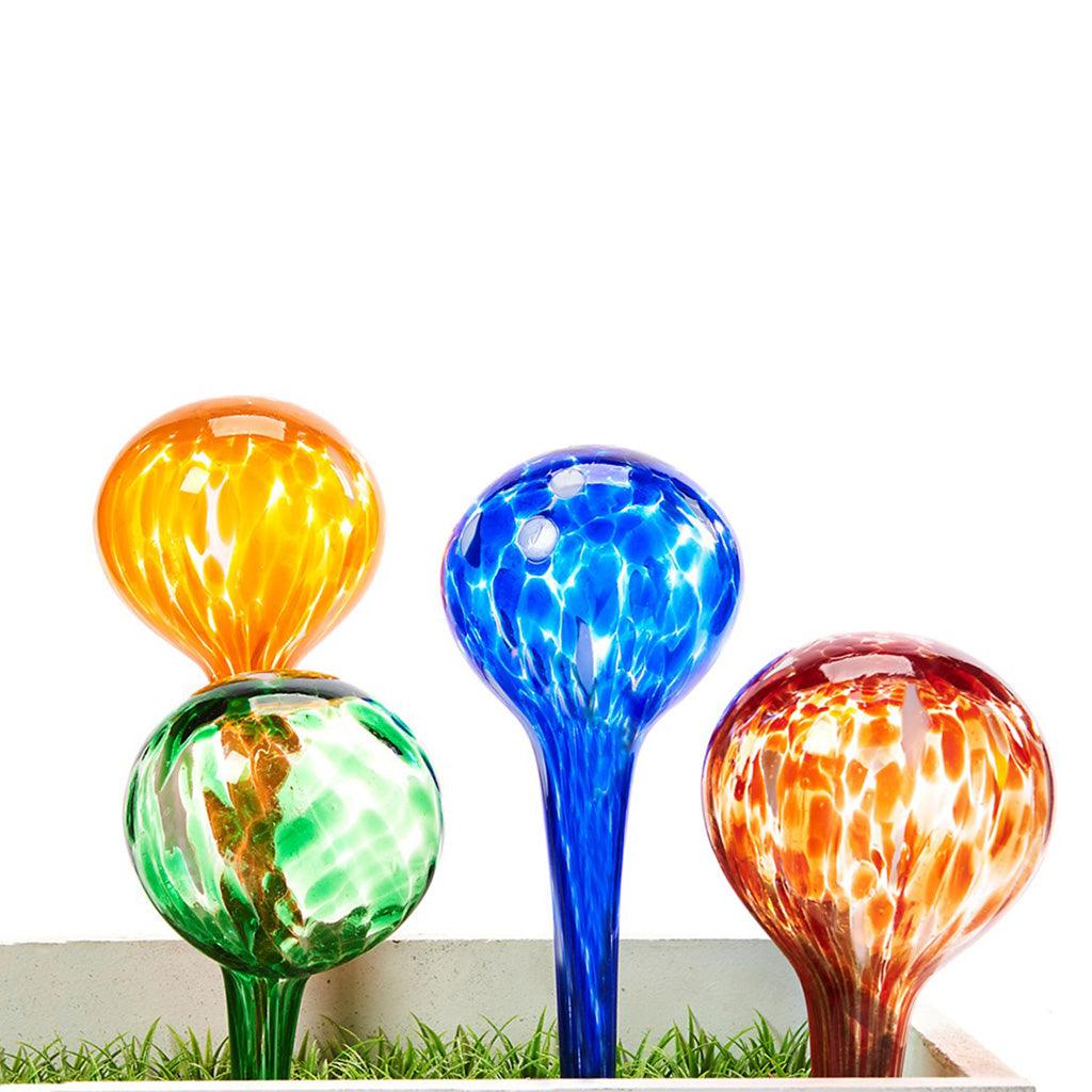 Effortlessly keep your plants hydrated and add a pop of color to your garden! This colorful set of watering balls makes it easy to keep your plants healthy and vibrant while also adding a touch of style to your garden.