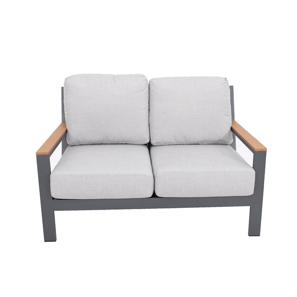 Bring classic style and comfort to your outdoor space with the Coronado Collection Loveseat. With a crafted aluminum frame and finish with teak-coloured armrests, the deep seating loveseat provides elegant relaxation. Measures 35.1in H x56.3in W x 37in D. 