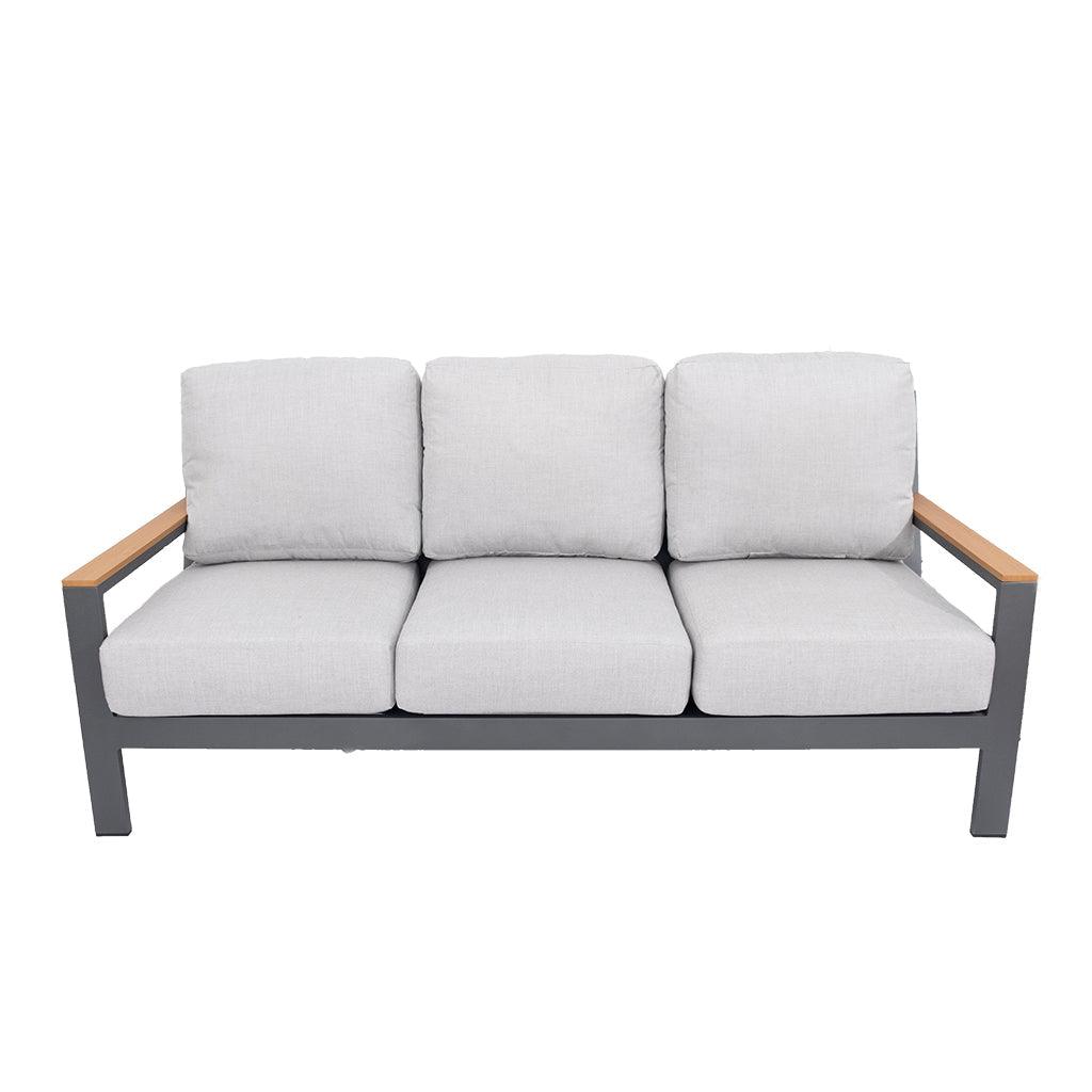 The Coronado Collection Sofa adds neutral flares and accents to create a timeless deep-seating setting. With a crafted aluminum frame and finish with teak-coloured armrests, sink into deep comfort with custom made neutral cushions. Measures 35.1"H x 81.9"W x 37"D.