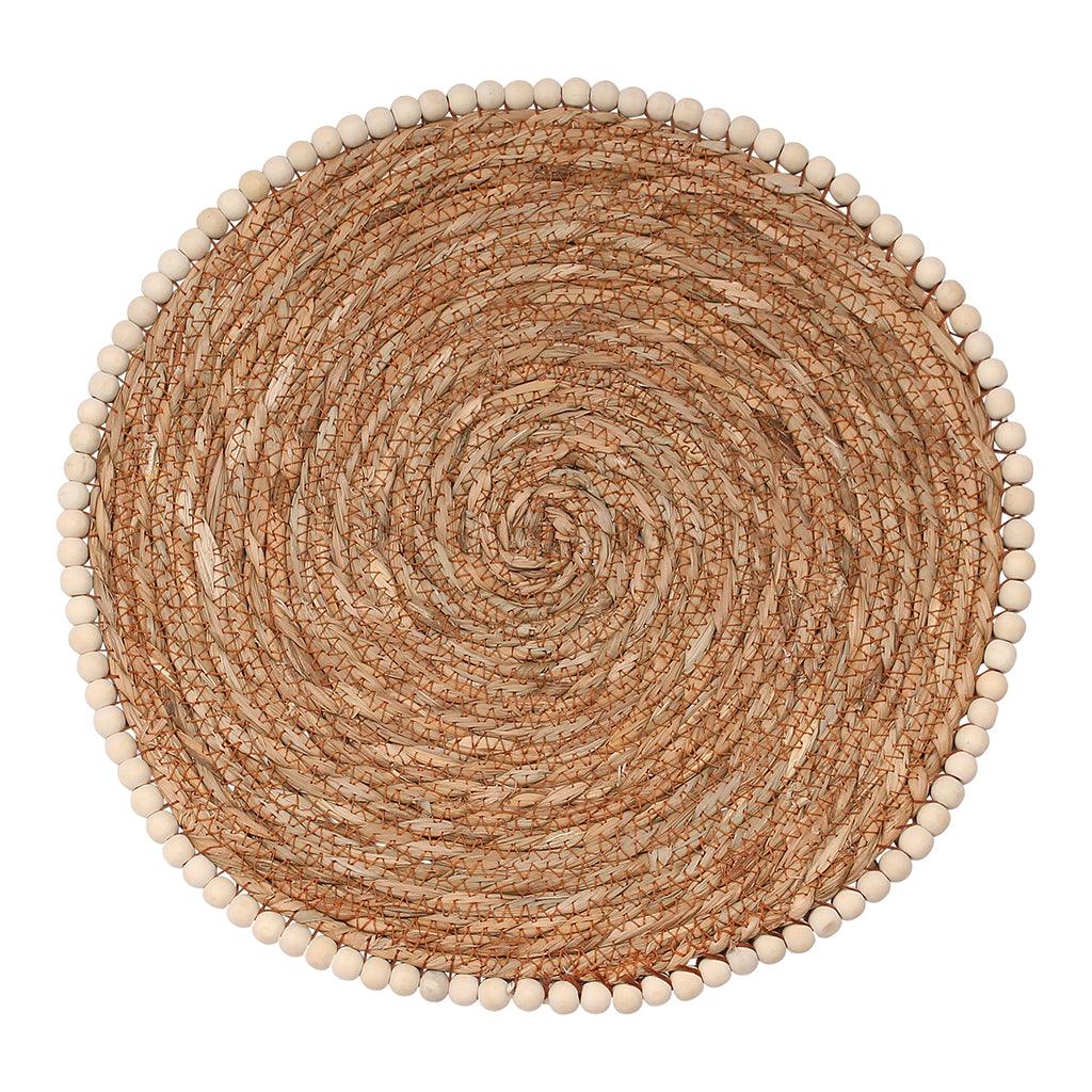 Perfect for all seasons, this handwoven and natural placemat adds warmth and a rustic feel to any table setting. The unique design offers an effortless way to add texture and interest to your table.