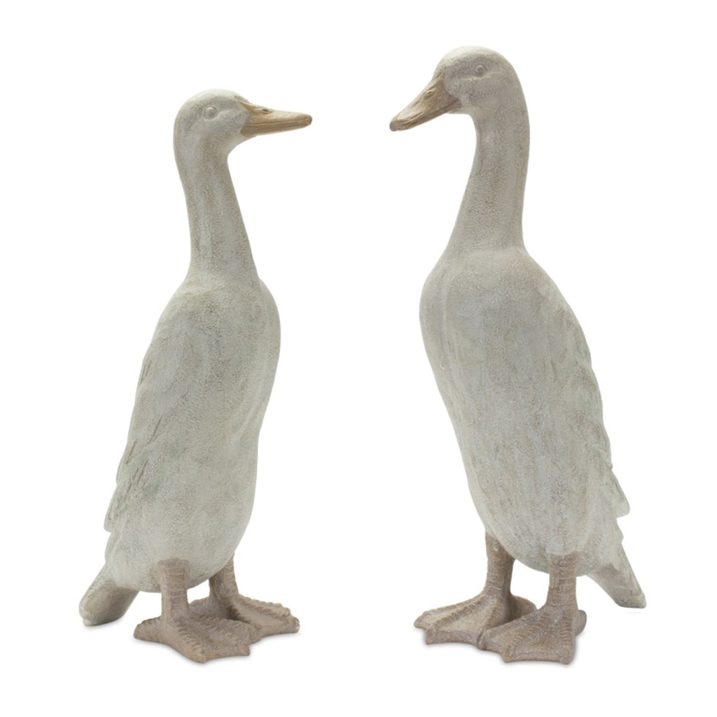 These charming duck sculptures are available in two different heights, making it easy to find the perfect fit for your space. With durable resin construction, you can enjoy these delightful statues for years to come. Measures 17.5&quot;H or 18.75&quot;H.  Sold separately.