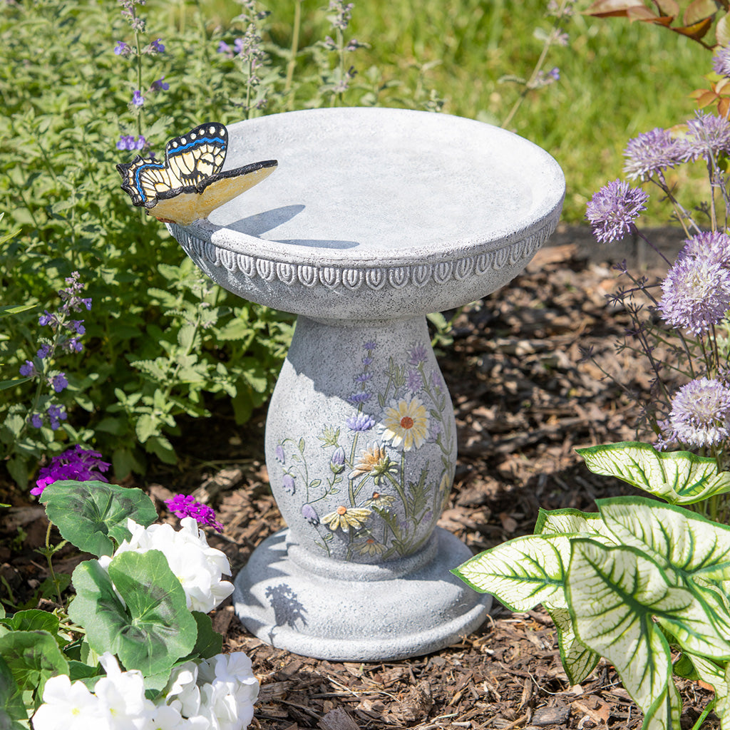 Transform your garden into a peaceful oasis with the Wildflower Bird Bath. Featuring natural details of butterflies and wildflowers, it&#39;s the perfect addition for attracting local birds and adding a touch of charm to your outdoor space.